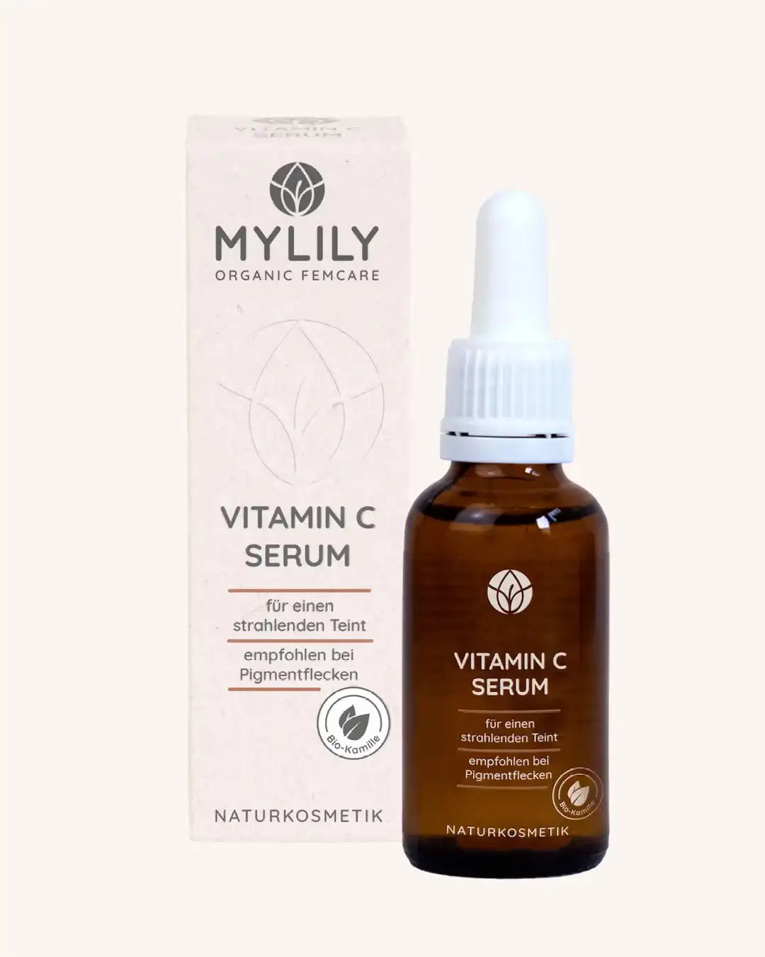 MYLILY Organic Femcare Vitamin C Serum Flasche neben der Verpackung. Naturkosmetik ohne Duftstoffe.