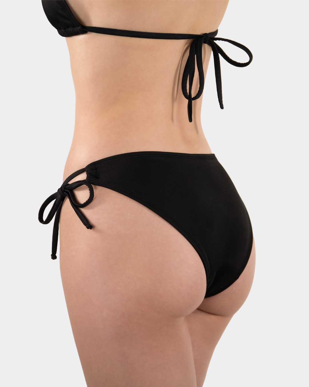 Perioden Bikinihose Tanga Schnürung von MYLILY in einer detaillierten Seiten-Ansicht.